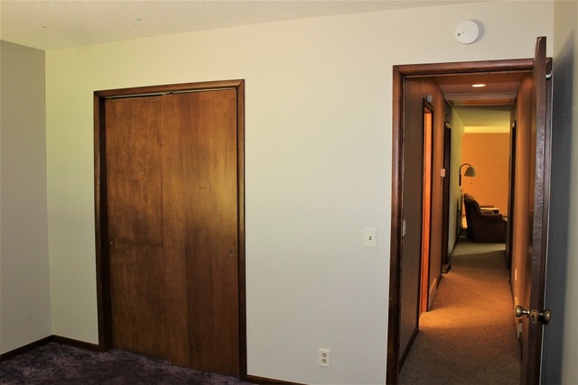 15890 Bishop Road Morrison, IL 61270 - Photo 26 of 34 a view of hallway with closet and a mirror