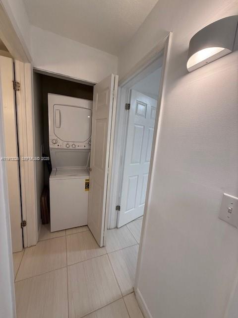 12136 St.Andrews Place, Unit 204 Miramar, FL 33025 - Photo 14 of 21 a view of a storage & utility room with refrigerator and mirror
