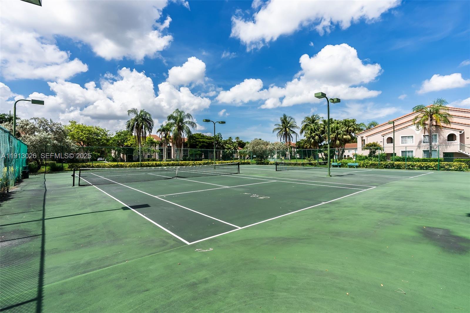 12136 St.Andrews Place, Unit 204 Miramar, FL 33025 - Photo 21 of 21 a view of a tennis court