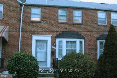 5741 Edgepark Road Baltimore, MD 21239 - Photo 6 of 16 a brick building with a large windows