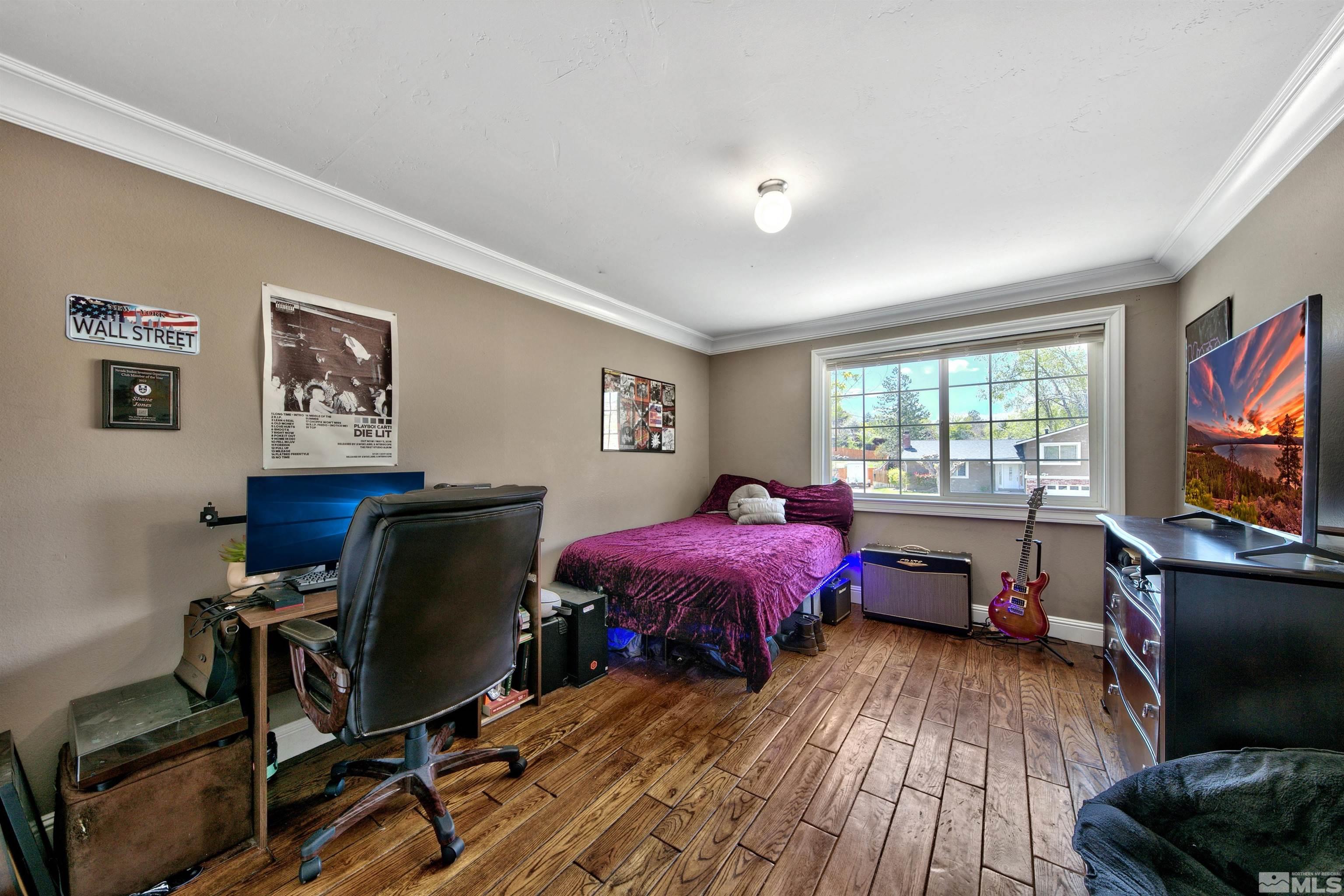 1070 Mark Allen Circle Reno, NV 89503 - Photo 11 of 11 a view of a workspace with furniture and a window