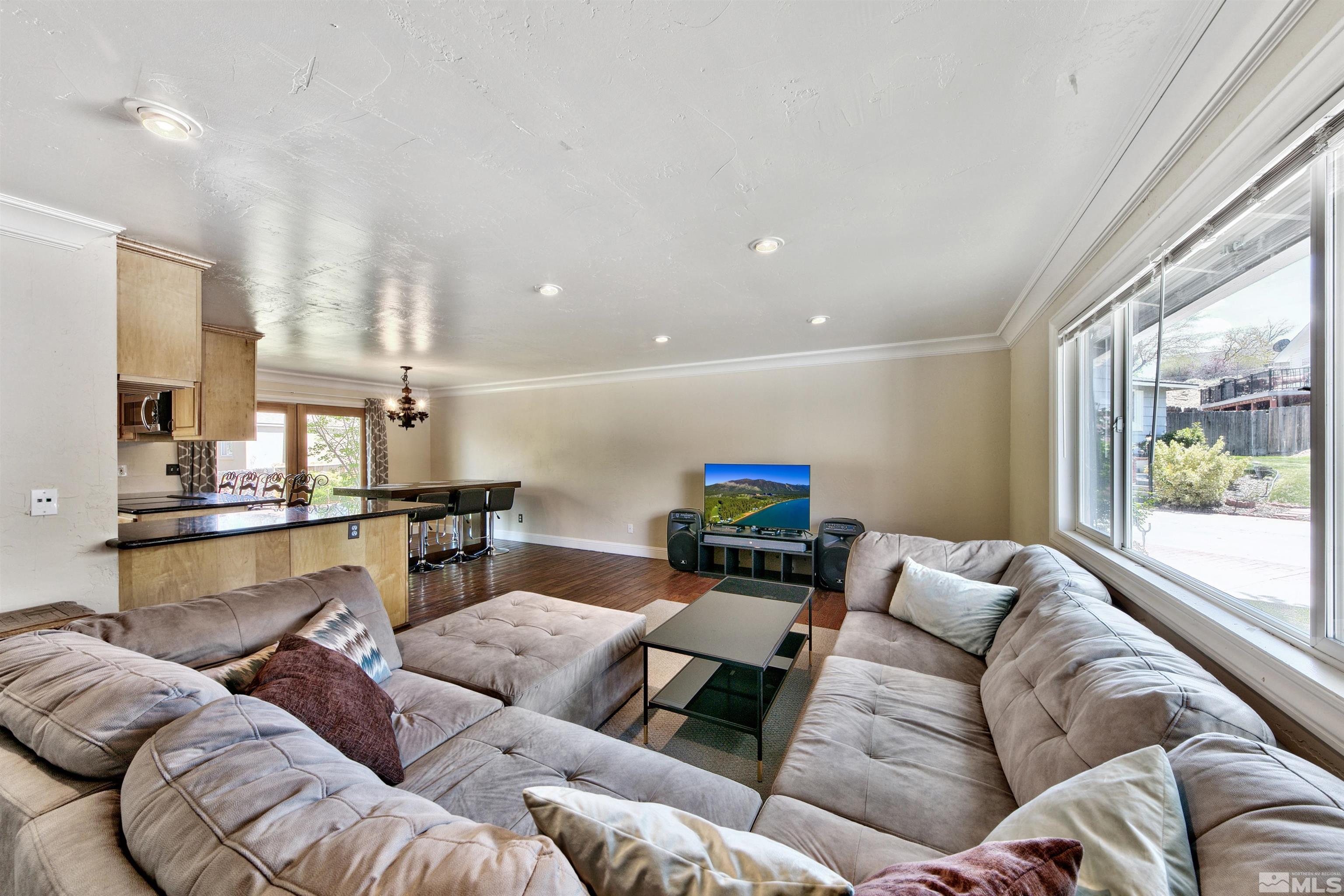 1070 Mark Allen Circle Reno, NV 89503 - Photo 4 of 11 a living room with furniture and a large window