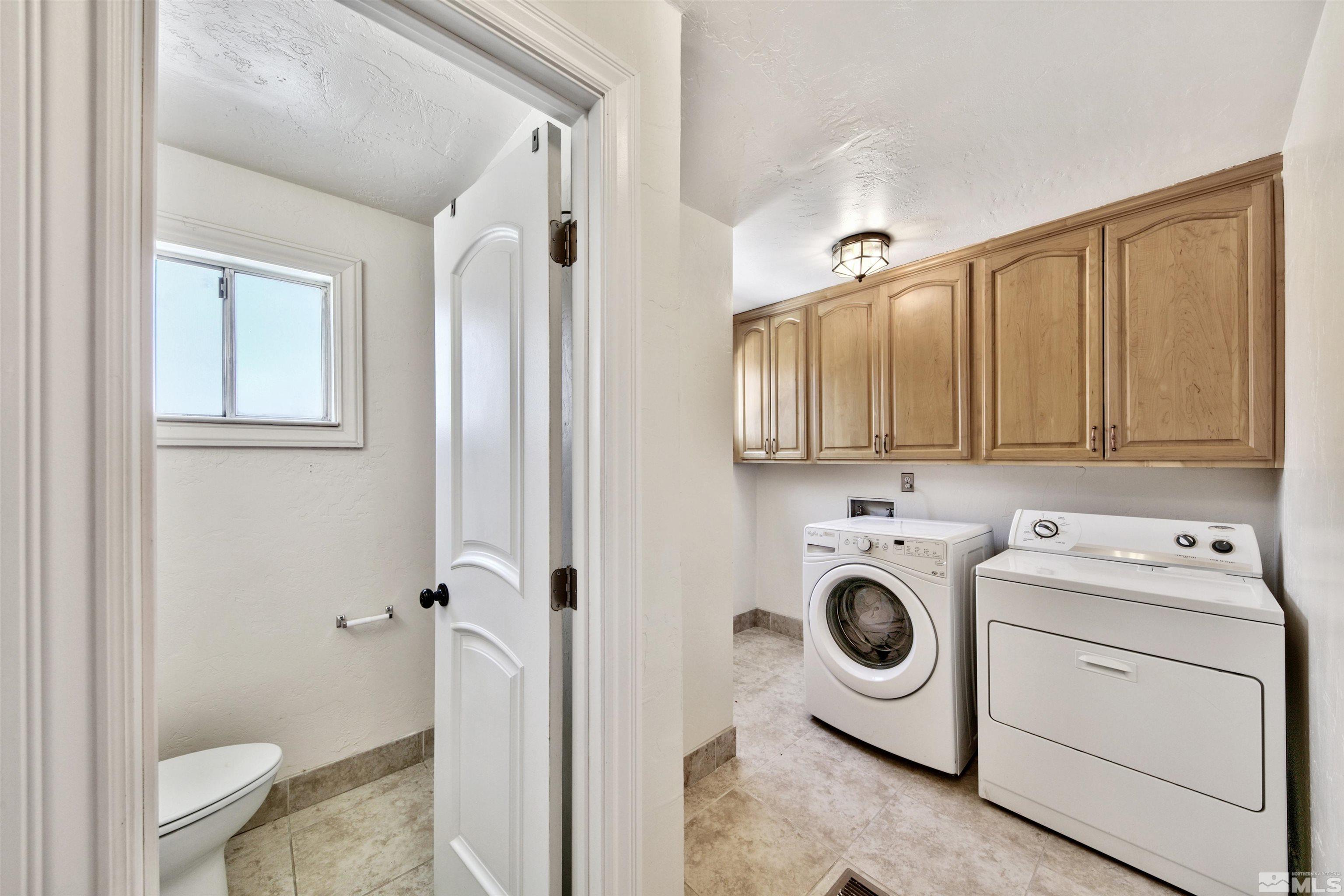 1070 Mark Allen Circle Reno, NV 89503 - Photo 8 of 11 a view of bathroom with a washer and dryer
