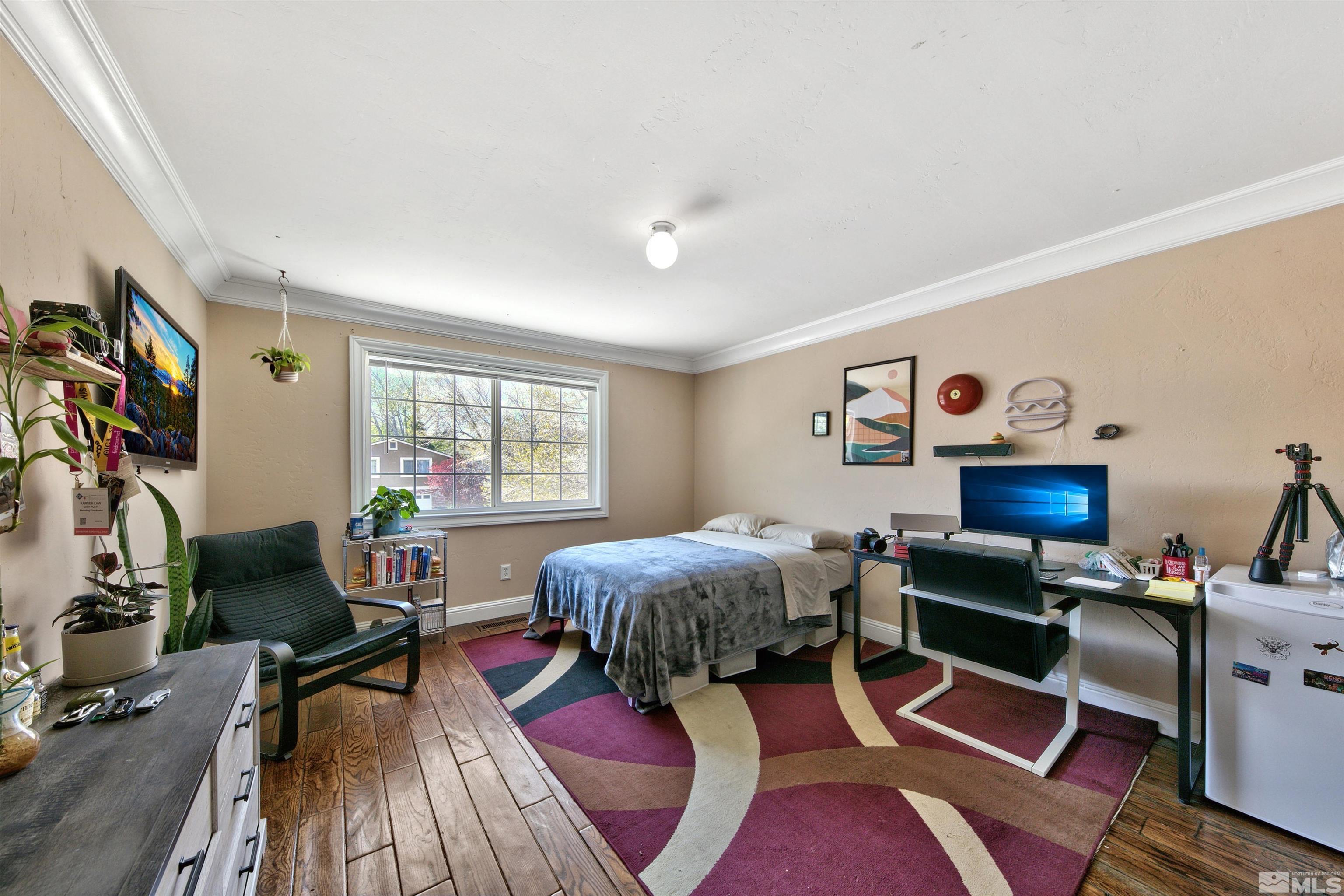 1070 Mark Allen Circle Reno, NV 89503 - Photo 10 of 11 a living room with furniture and a flat screen tv