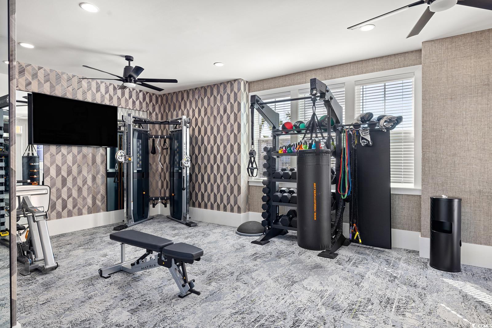 283 Ferretti Street, Unit CONCORD Myrtle Beach, SC 29579 - Photo 16 of 34 Exercise room with ceiling fan, wallpapered walls, and recessed lighting