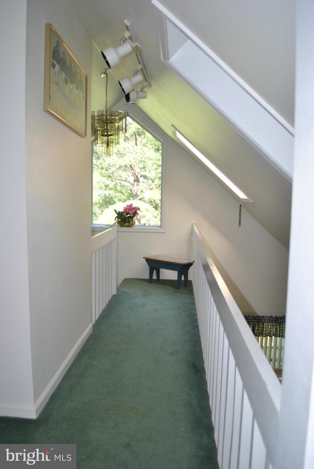 7400 Bozman Neavitt Road Bozman, MD 21612 - Photo 13 of 13 upstairs landing leading to bedrooms