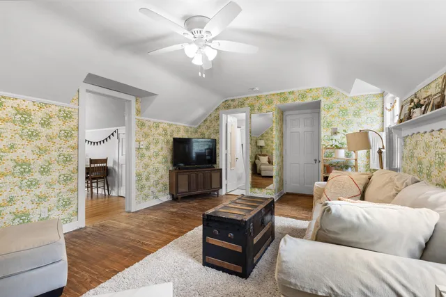 a view of a room with a large window