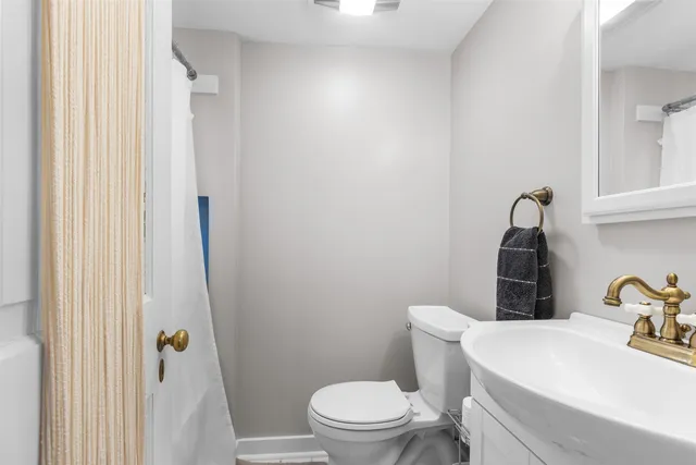 a view of a backyard with table and chairs and a yard