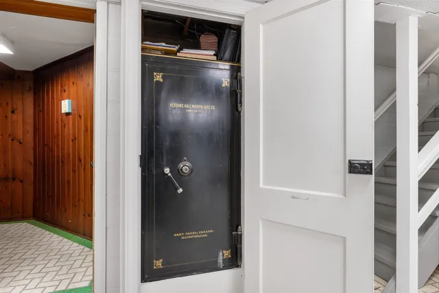 an aerial view of a house with outdoor space and street view