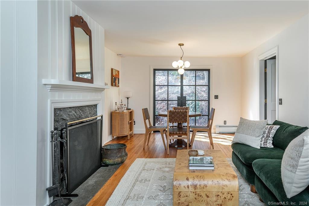23 Cook Street Washington, CT 06794 - Photo 17 of 39 a living room with furniture and a fireplace