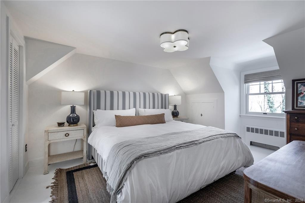 23 Cook Street Washington, CT 06794 - Photo 25 of 39 a bedroom with a bed and window