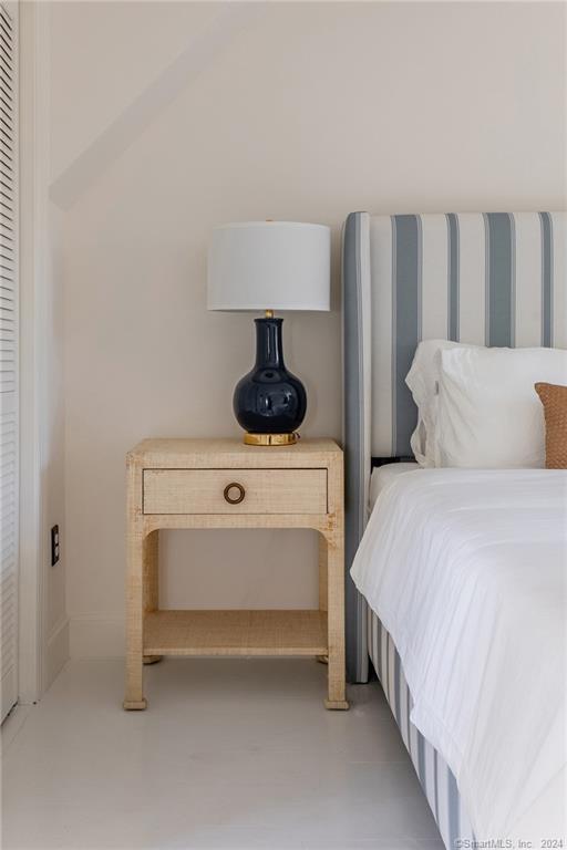 23 Cook Street Washington, CT 06794 - Photo 27 of 39 a bedroom with a bed and lamp