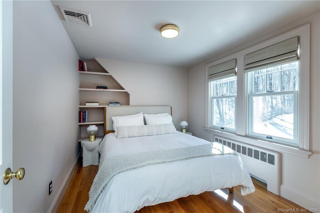 23 Cook Street Washington, CT 06794 - Photo 33 of 39 a bedroom with a bed and a window