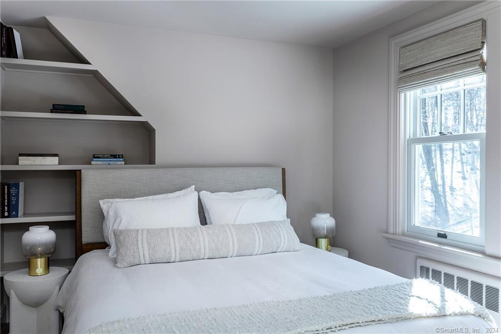 23 Cook Street Washington, CT 06794 - Photo 34 of 39 a bedroom with a bed and window