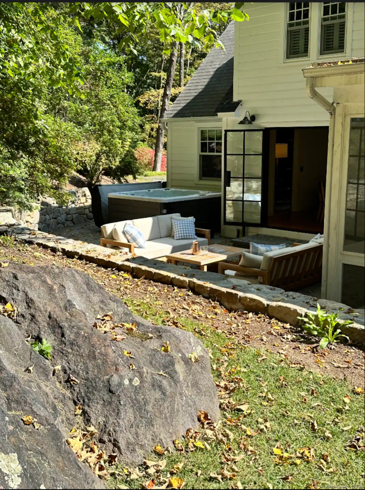 23 Cook Street Washington, CT 06794 - Photo 36 of 39 a backyard of a house with barbeque oven