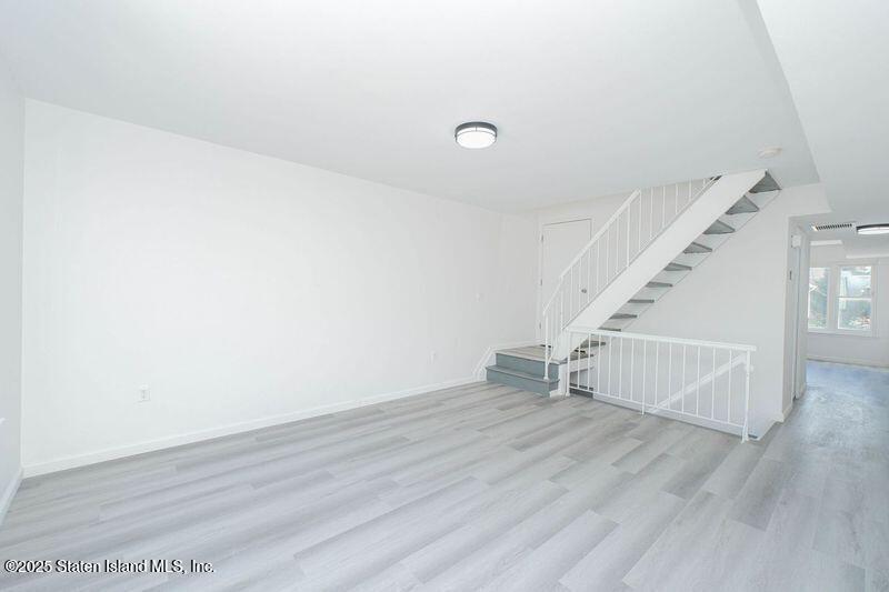 23 Vogel Loop Staten Island, NY 10314 - Photo 12 of 24 a view of entryway with wooden floor