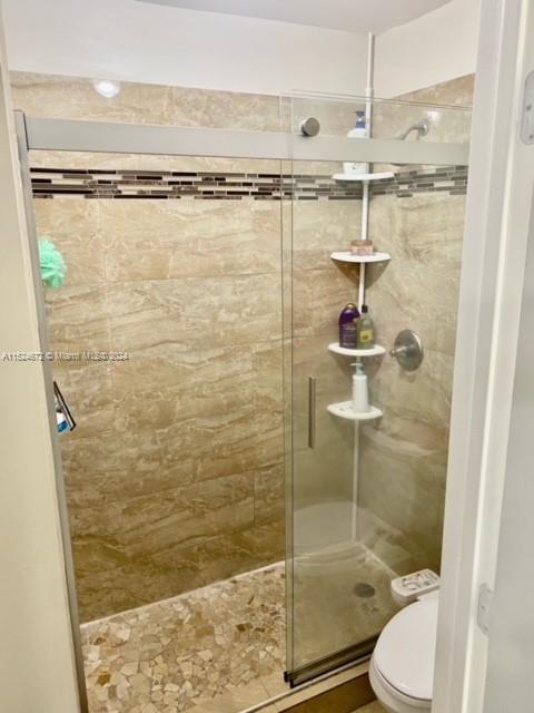 Goulds Miami, FL 33177 - Photo 7 of 18 a bathroom with a shower and toilet