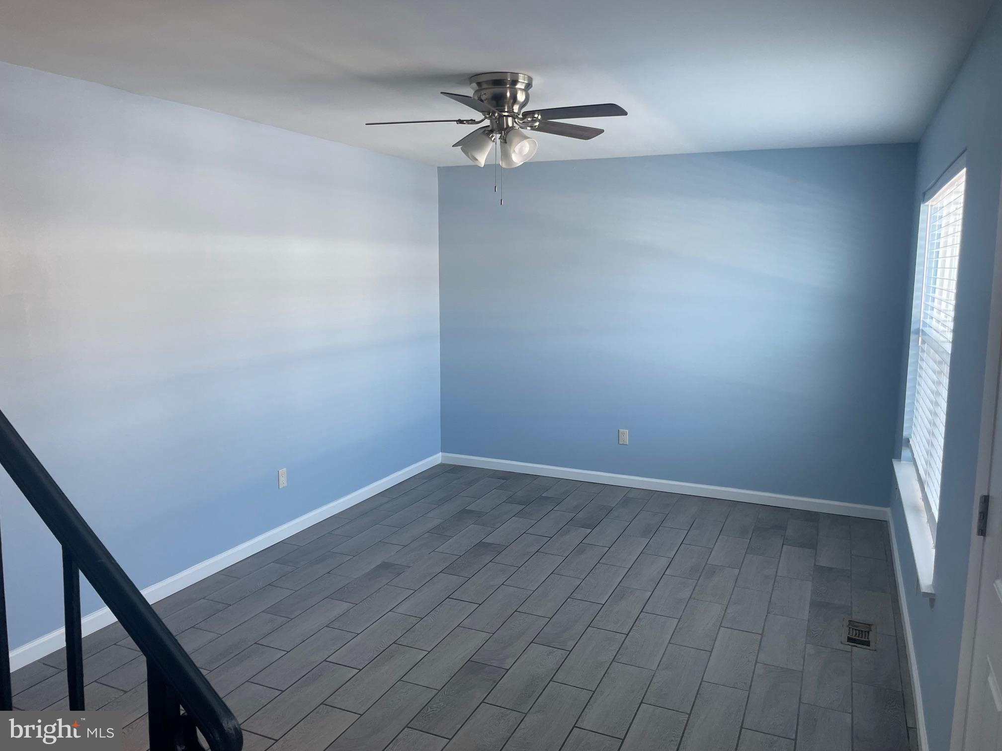6 Vernon Court Sicklerville, NJ 08081 - Photo 12 of 31 wooden floor in an empty room with a window