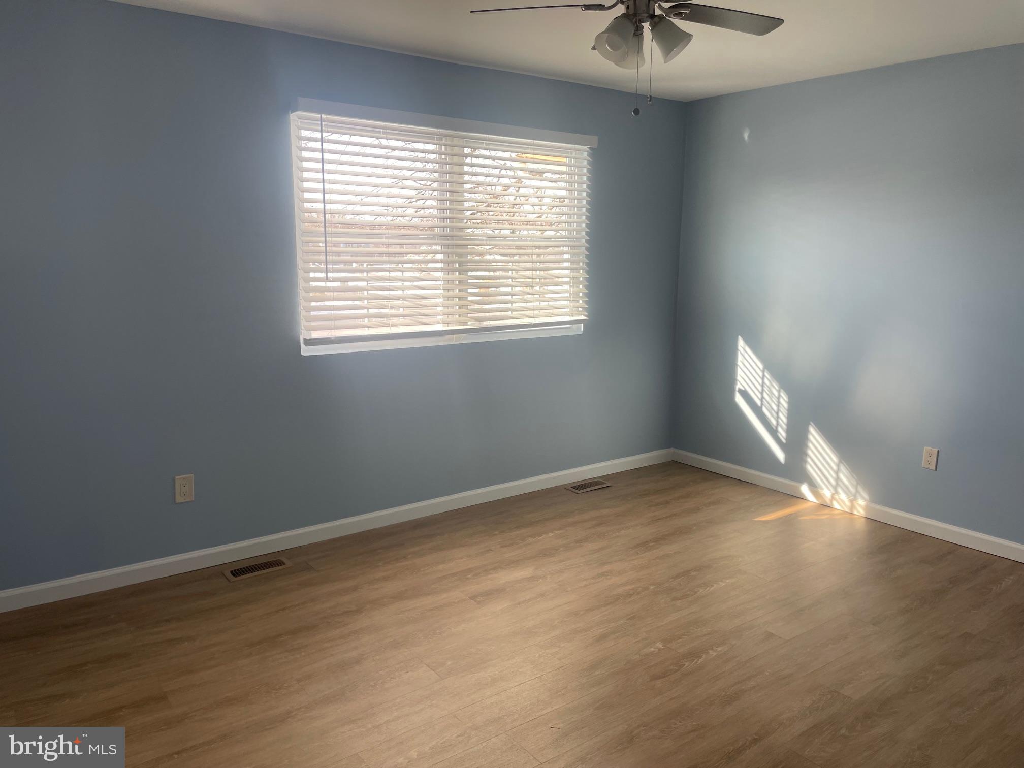6 Vernon Court Sicklerville, NJ 08081 - Photo 24 of 31 a view of an empty room with a window and a ceiling fan