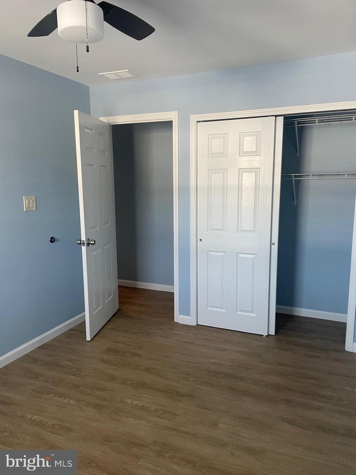 6 Vernon Court Sicklerville, NJ 08081 - Photo 29 of 31 an empty room with wooden floor and entryway