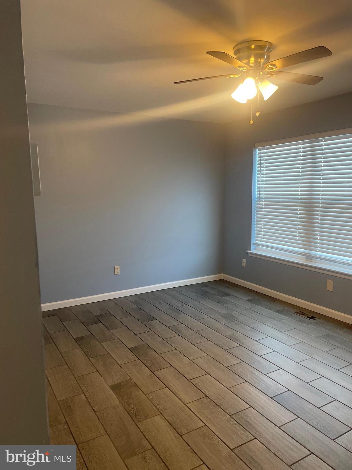 6 Vernon Court Sicklerville, NJ 08081 - Photo 10 of 31 a view of empty room with wooden floor