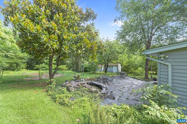 a view of backyard with green space