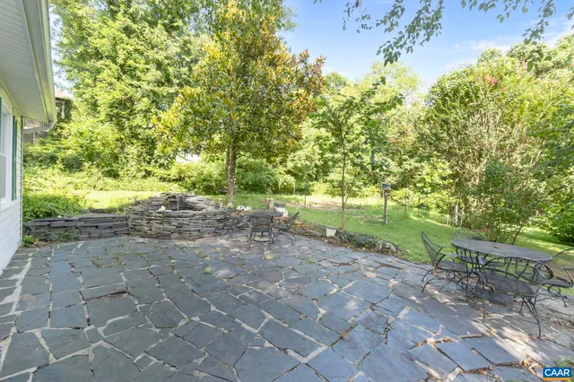 a view of backyard with green space