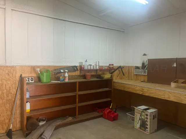 a view of a room with shelves