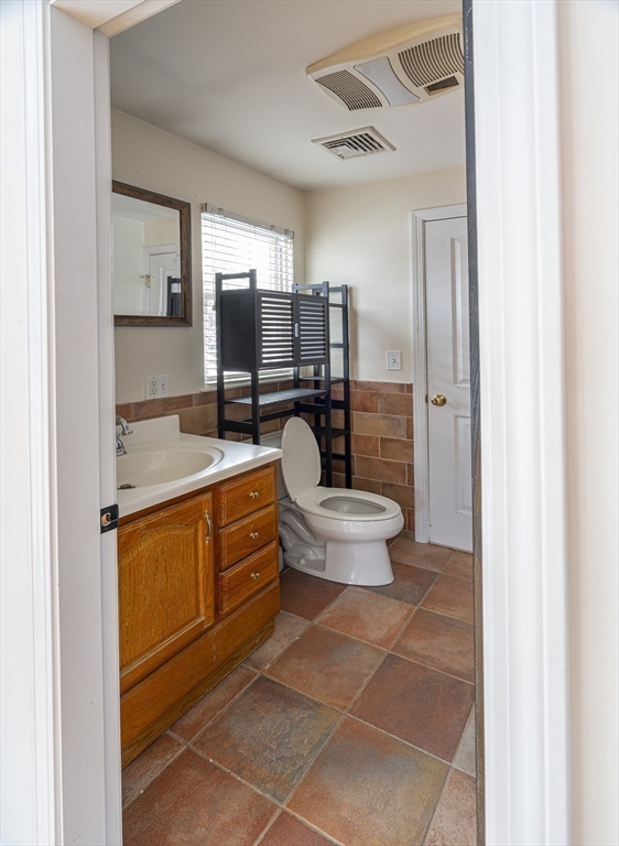 1364 High Street, Unit 1 Westwood, MA 02090 - Photo 14 of 16 a room with stainless steel appliances a sink and a refrigerator