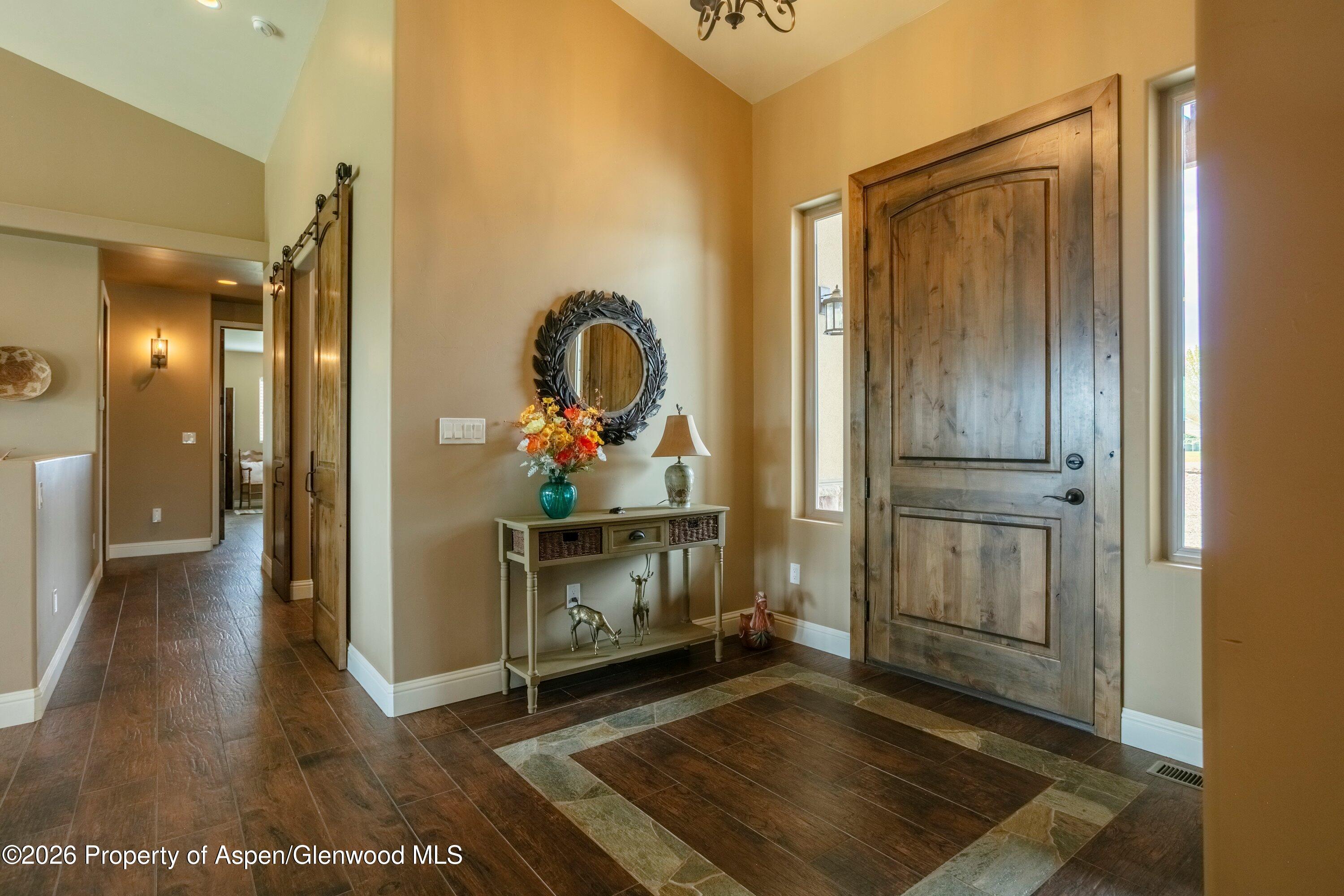 265 South Meadow Drive Rifle, CO 81650 - Photo 29 of 76 a view of hallway with livingroom and furniture