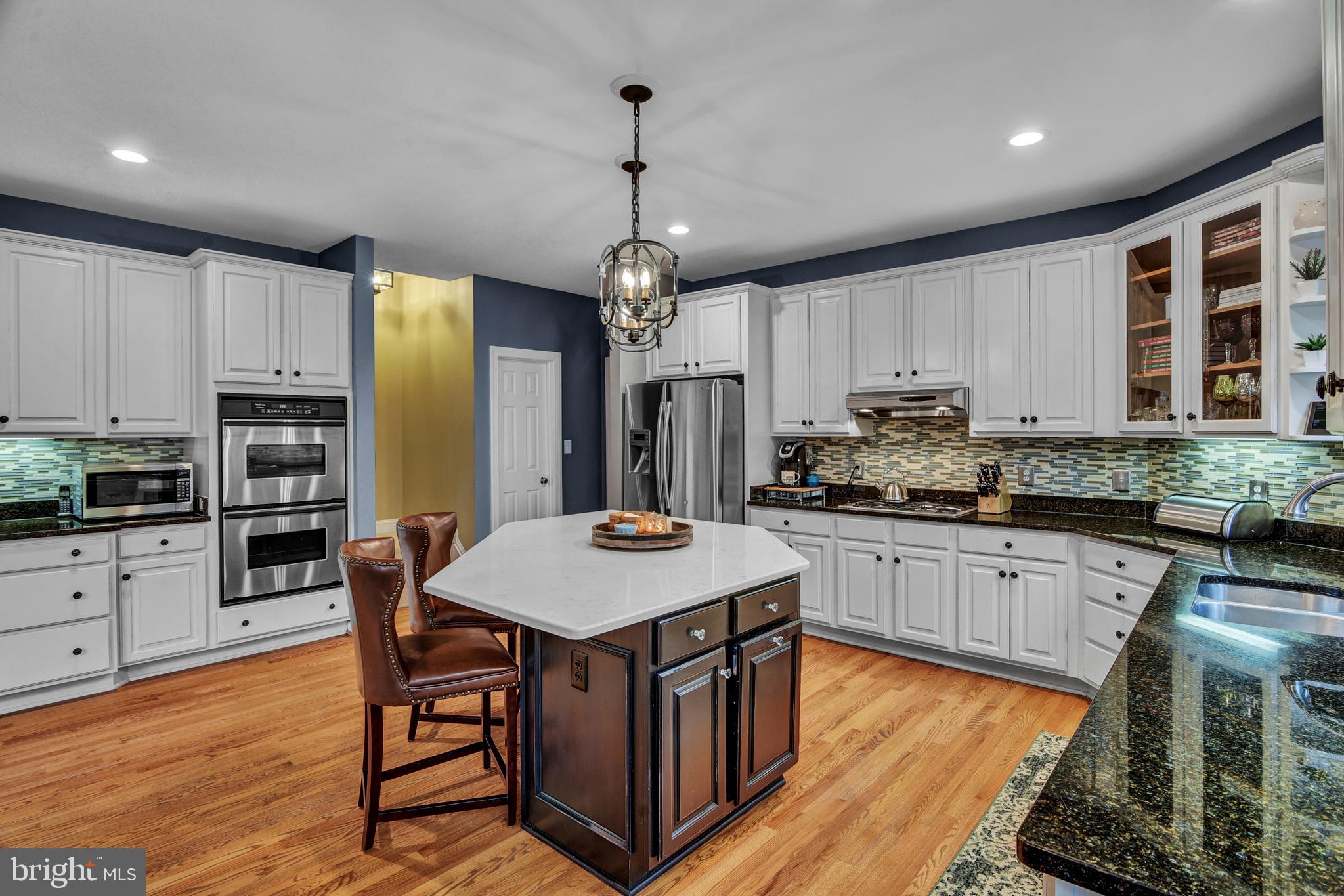 15321 Riding Club Drive Haymarket, VA 20169 - Photo 29 of 98 2nd staircase & mudroom off the kitchen
