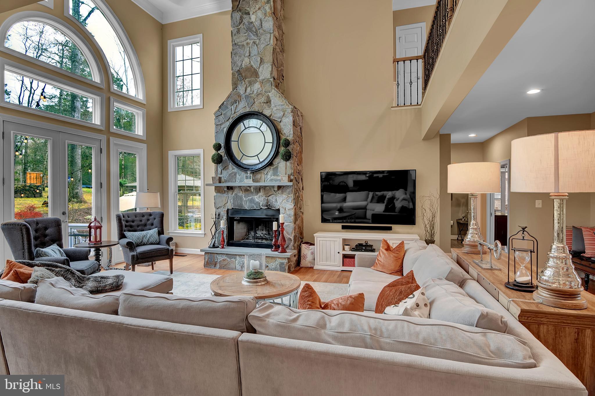 15321 Riding Club Drive Haymarket, VA 20169 - Photo 32 of 98 Natural light fills this two story great room!