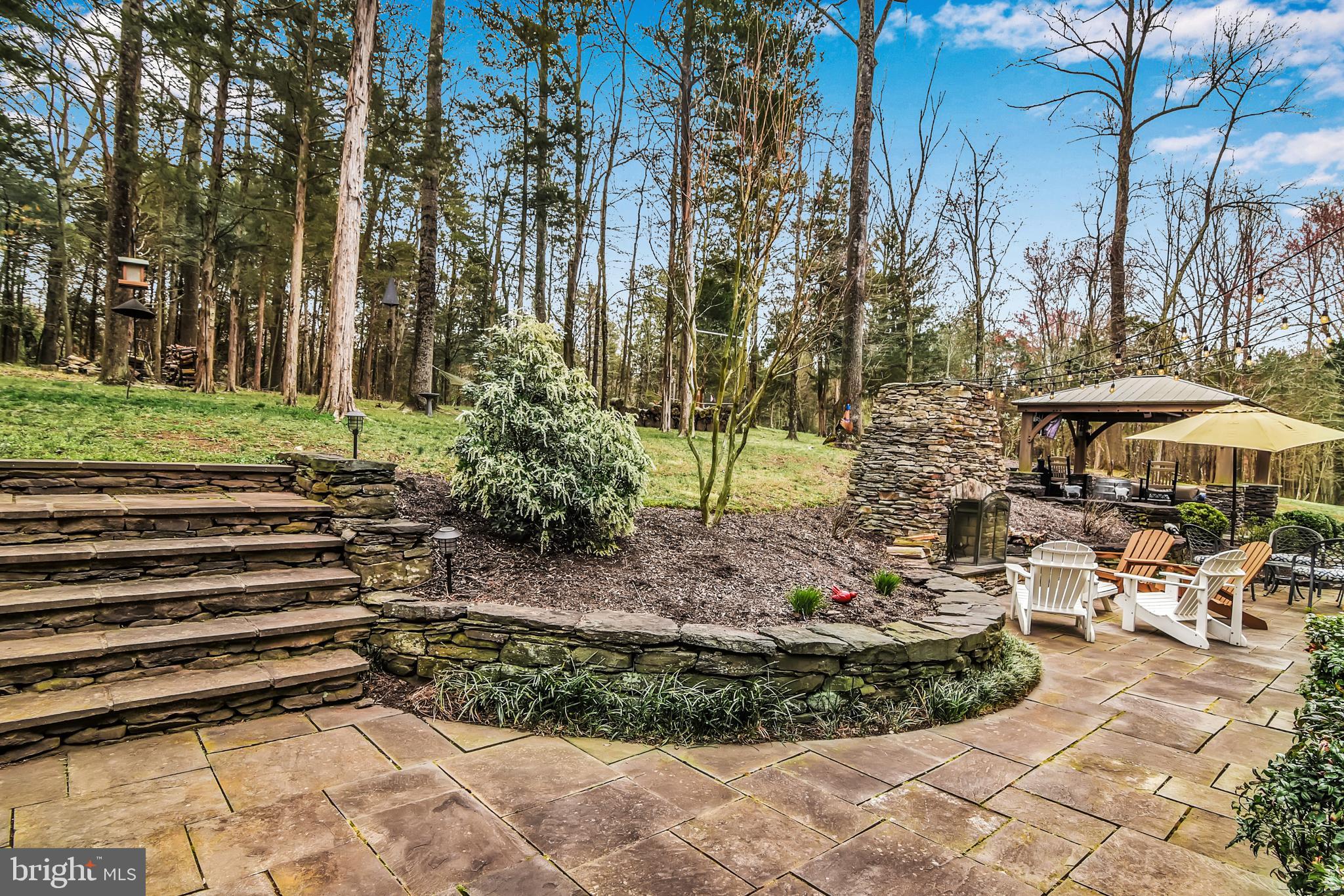 15321 Riding Club Drive Haymarket, VA 20169 - Photo 67 of 98 Slate patio off the deck