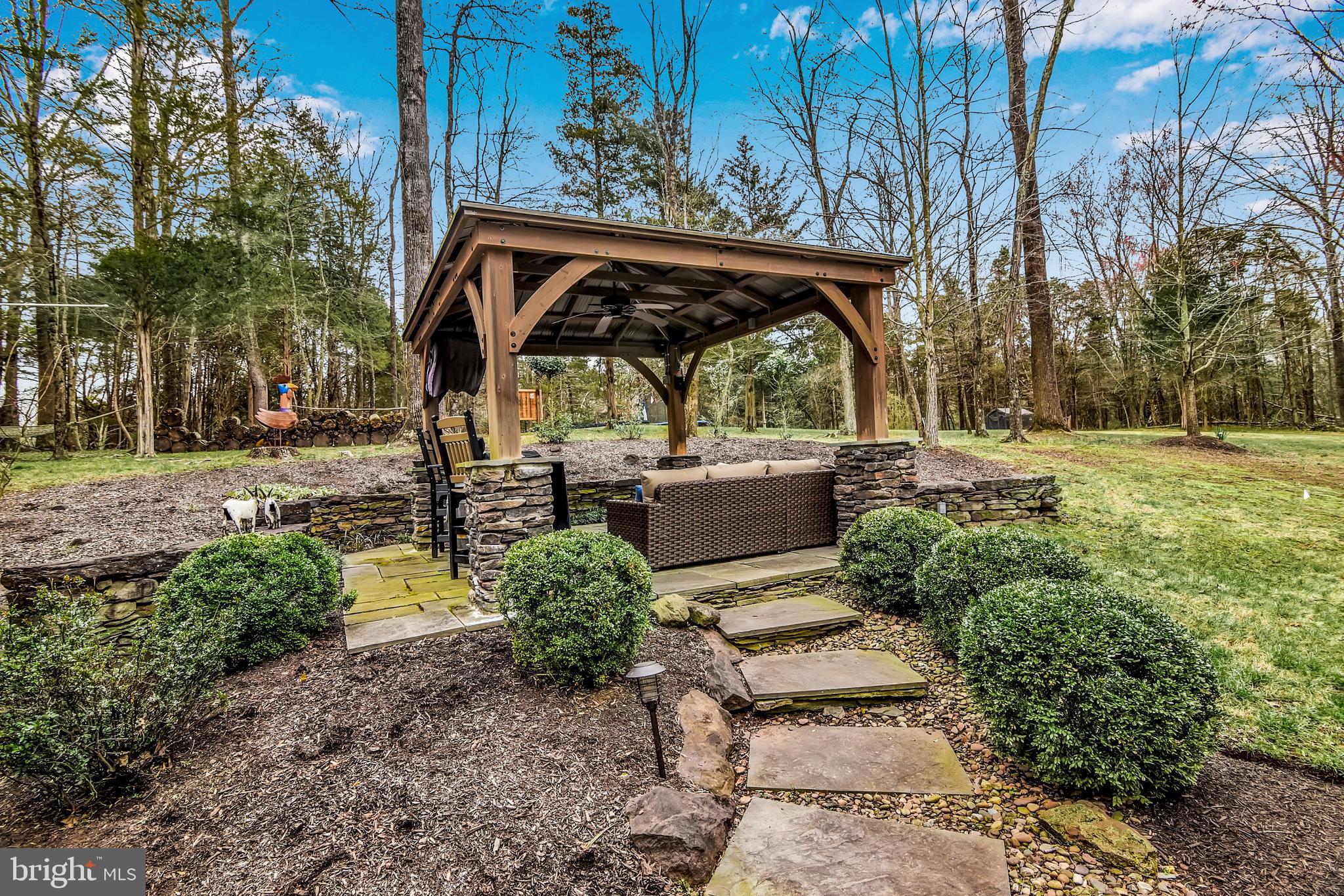 15321 Riding Club Drive Haymarket, VA 20169 - Photo 70 of 98 New metal roof gazebowith stacked stone base