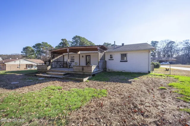 a house view with a garden space