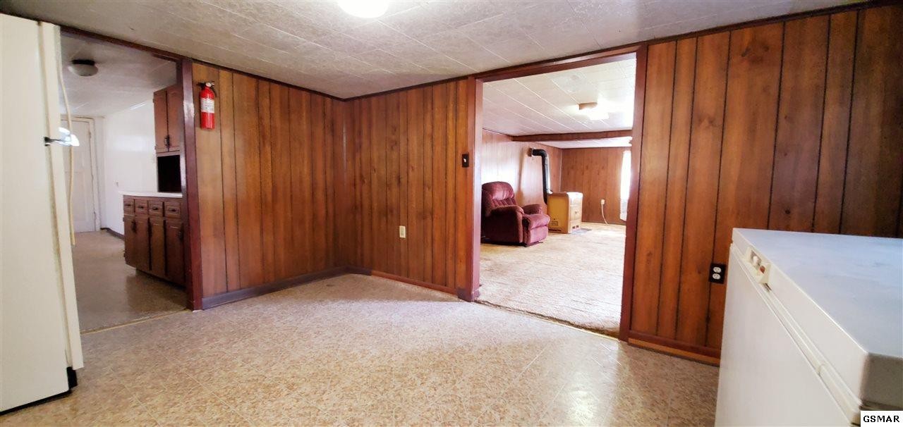 2485 Happy Hollow Road Sevierville, TN 37862 - Photo 17 of 35 wooden floor in an empty room