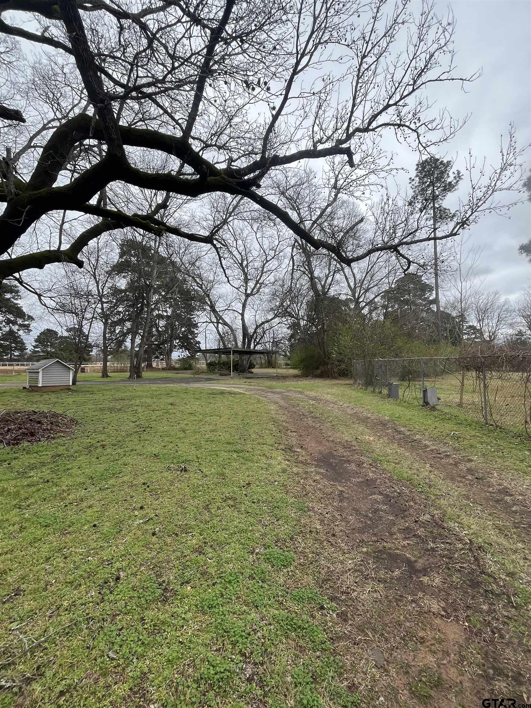 3614 Stone Road Kilgore, TX 75662 - Photo 3 of 8 a view of outdoor space with deck and yard