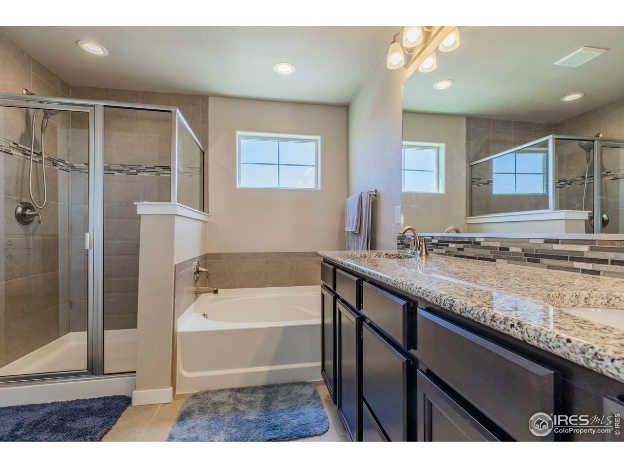 8705 15th St Road Greeley, CO 80634 - Photo 21 of 32 Master Bath w/soaking tub and Double Vanity