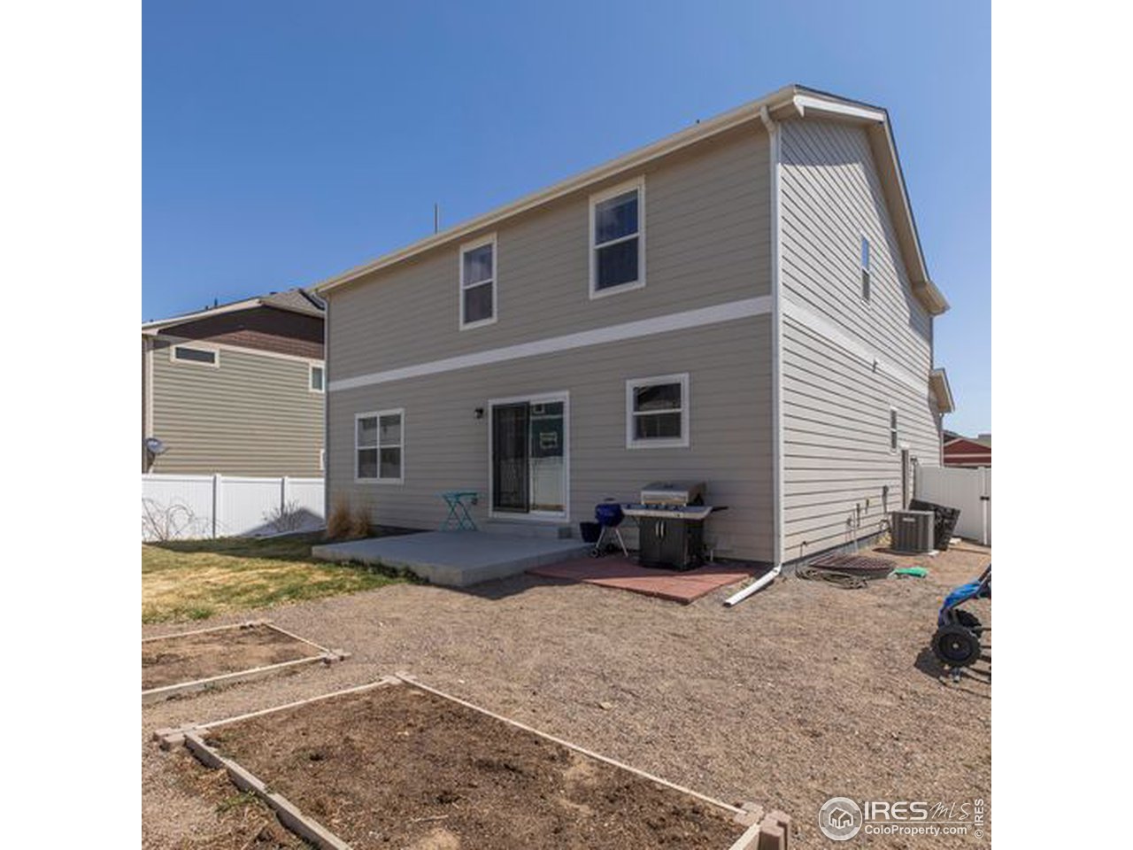 8705 15th St Road Greeley, CO 80634 - Photo 29 of 32 Large Fenced Backyard with Garden beds