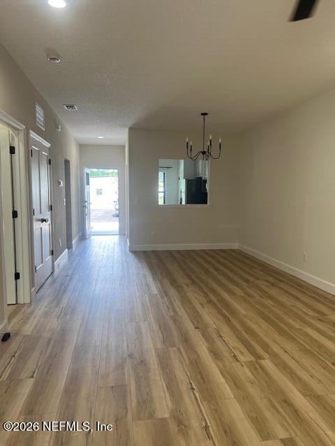 687 South Orange Street Starke, FL 32091 - Photo 11 of 13 a view of empty room with wooden floor