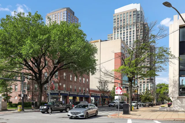 a view of a building with a fountain in front of it