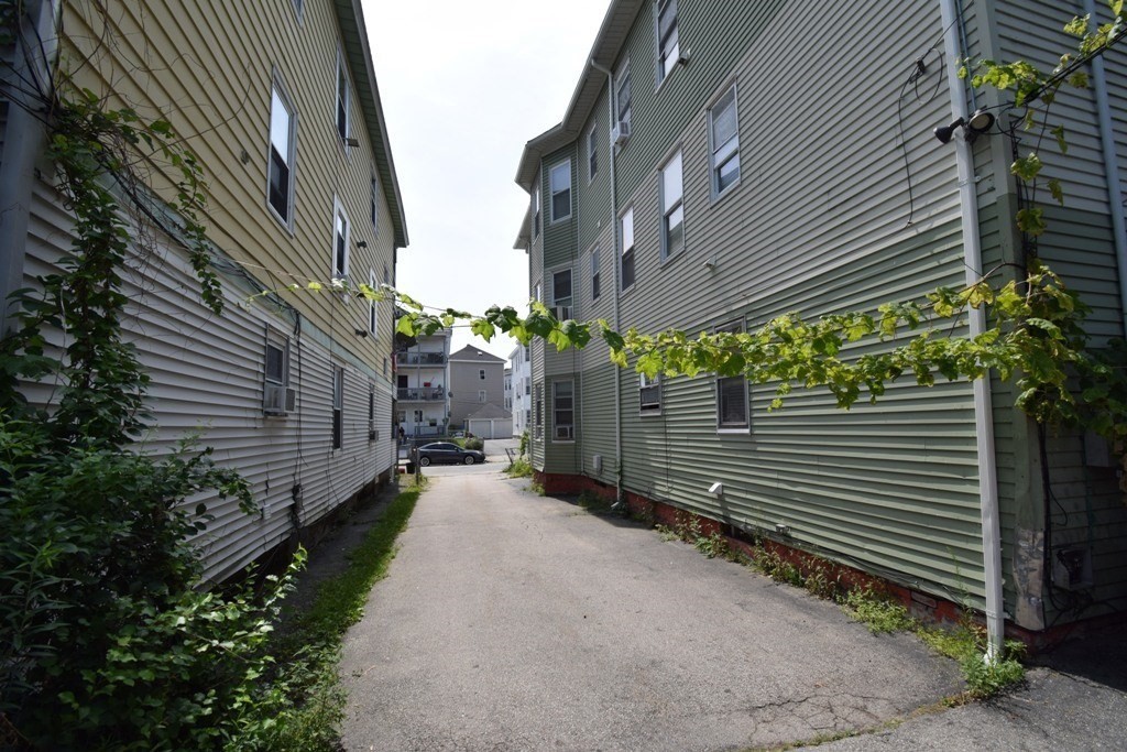 6 Pelham Street Worcester, MA 01609 - Photo 20 of 23 a view of a house with a yard