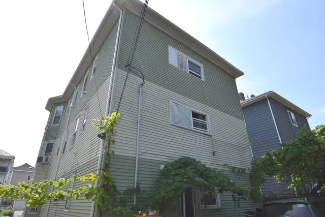 a view of a back yard of the house