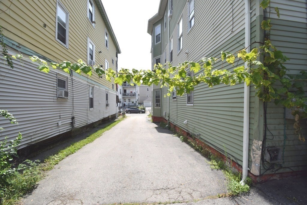 6 Pelham Street Worcester, MA 01609 - Photo 23 of 23 a view of a back yard of the house