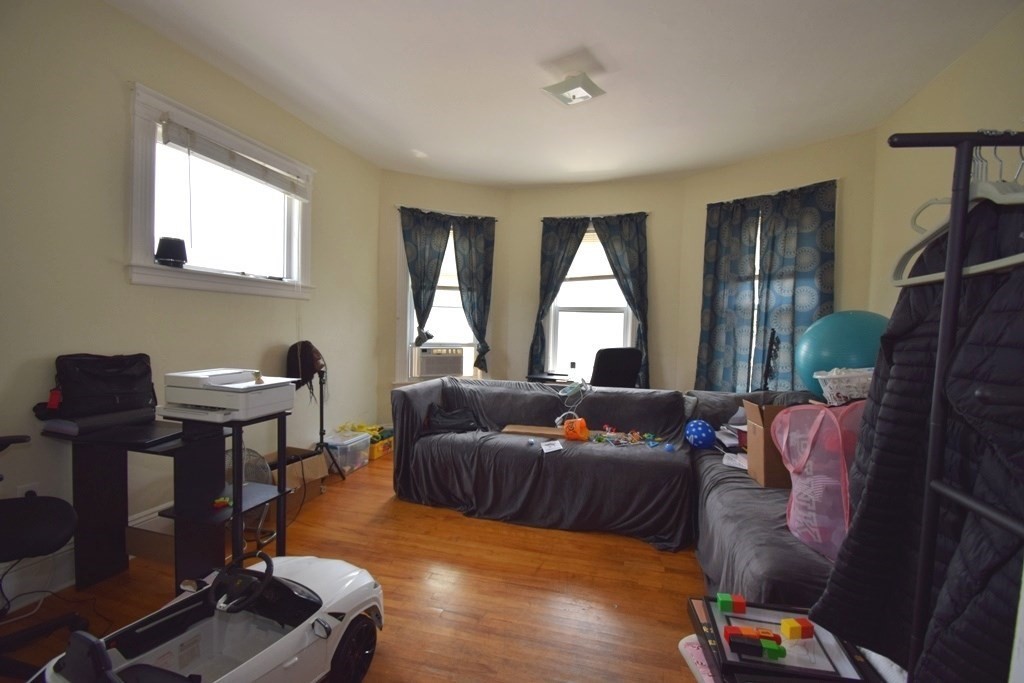 6 Pelham Street Worcester, MA 01609 - Photo 10 of 23 a living room with furniture and a window