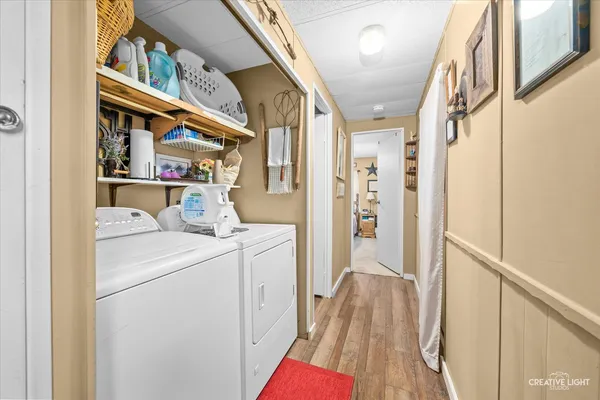 a view of hallway with washer and dryer