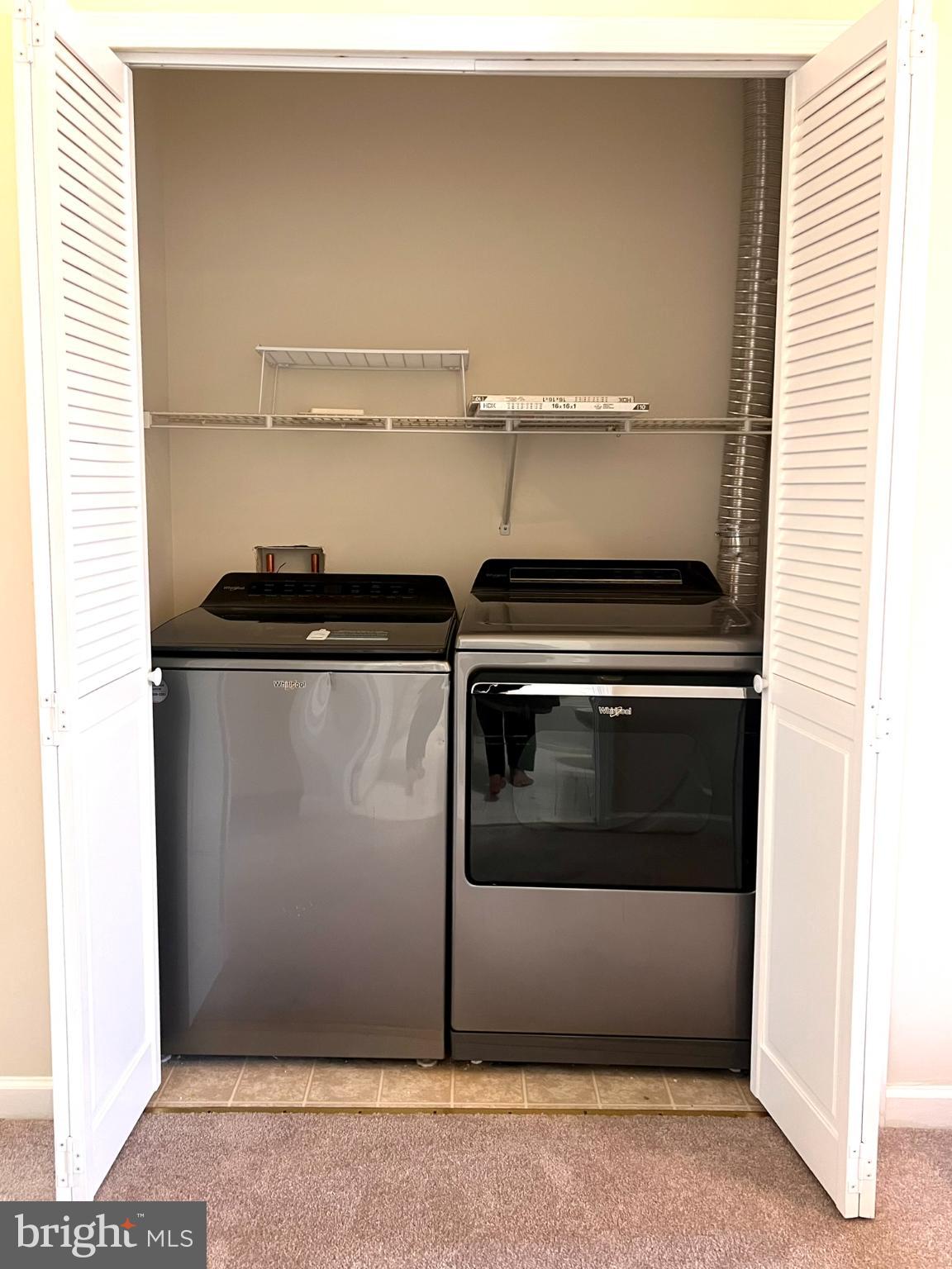 25205 Larks Terrace Chantilly, VA 20152 - Photo 23 of 28 Efficient laundry space with modern appliances.