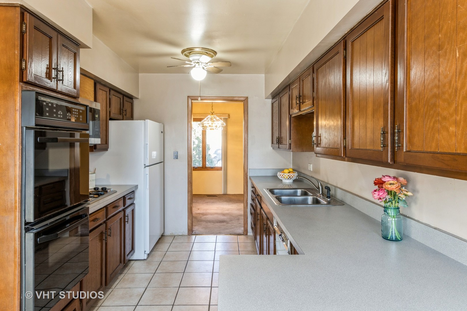 75 Carthage Lane Hoffman Estates, IL 60169 - Photo 16 of 33 a kitchen with stainless steel appliances granite countertop a refrigerator and a stove