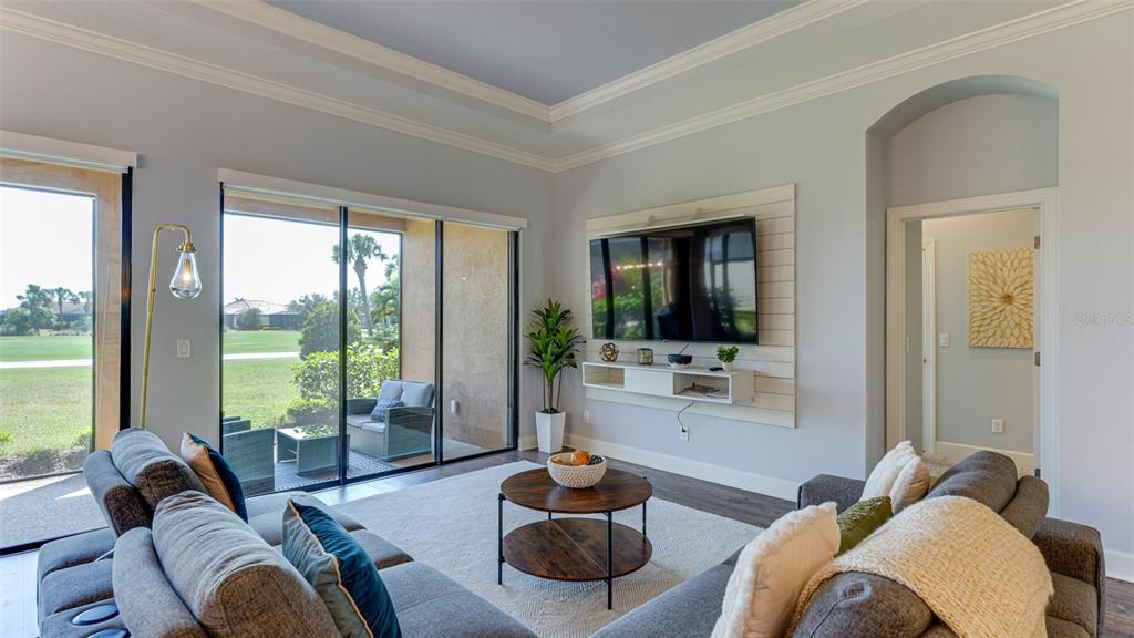 4511 Terrazza Court Lakewood Ranch, FL 34211 - Photo 8 of 65 a living room with furniture and a potted plant