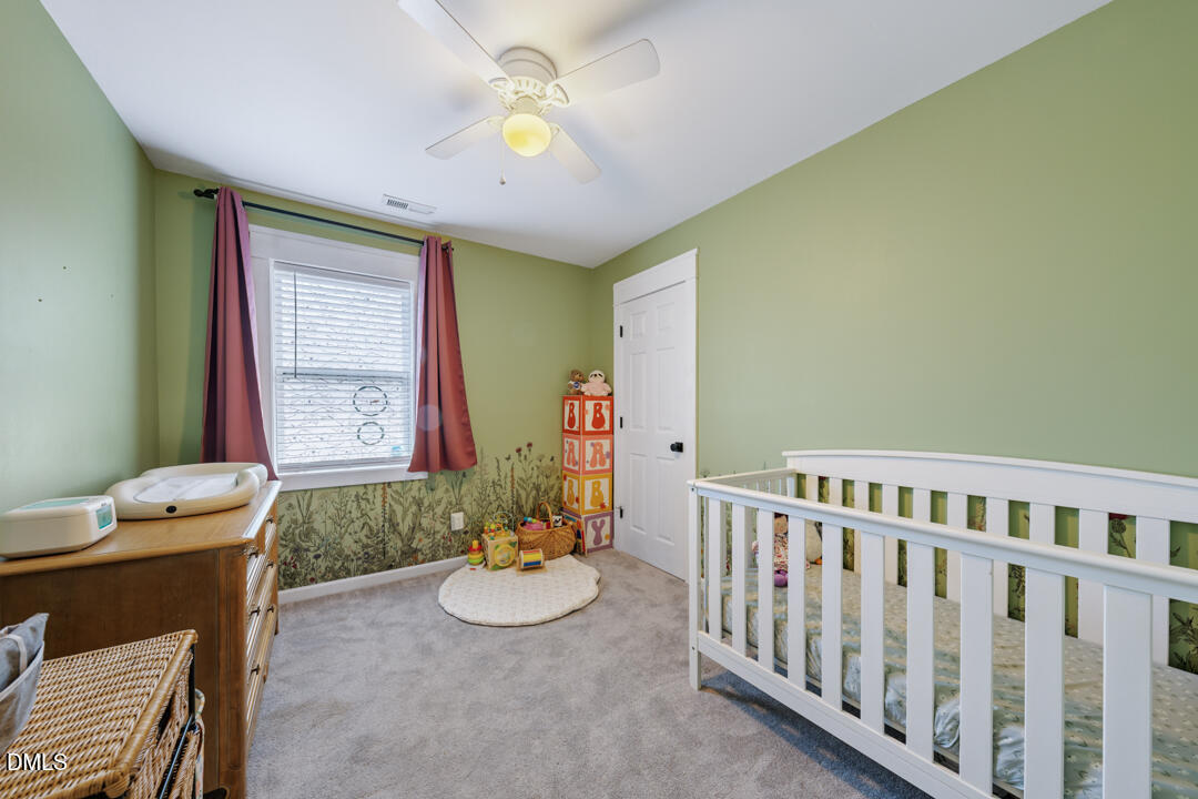 806 South Roxboro Street Durham, NC 27707 - Photo 11 of 25 a view of a dining room with furniture and a window